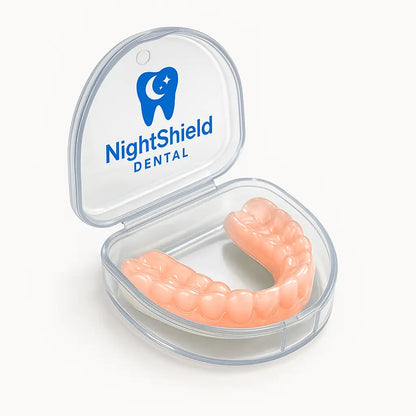 Orange dental night guard in a clear NightShield Dental case on a white background